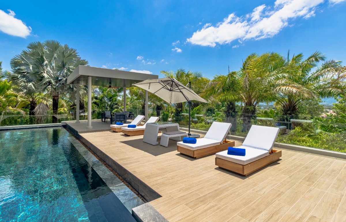 Villa Lion pool terrace under a bright Phuket sky